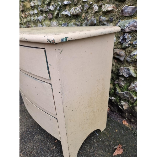 1294 - A continental cream painted pine chest of drawers, 77cm wide.