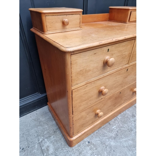 1299 - A Victorian pine mirror back chest, 105cm wide.