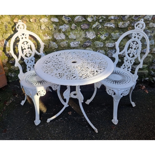 1318 - A white painted aluminium garden table and two chairs, the table 68.5cm diameter. (3)... 