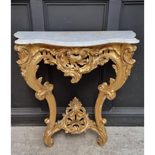 1321 - A 19th century, Louis XV style, carved giltwood and marble top console table, 97cm high x 96.5c... 