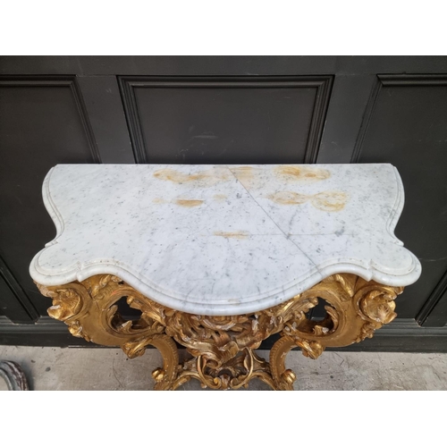 1321 - A 19th century, Louis XV style, carved giltwood and marble top console table, 97cm high x 96.5c... 