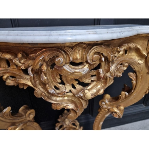 1321 - A 19th century, Louis XV style, carved giltwood and marble top console table, 97cm high x 96.5c... 