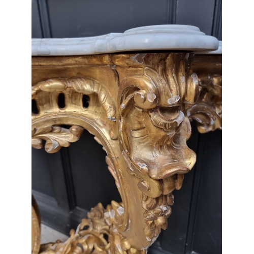 1321 - A 19th century, Louis XV style, carved giltwood and marble top console table, 97cm high x 96.5c... 