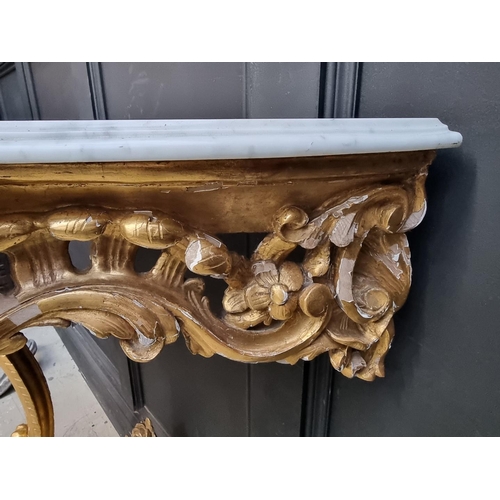 1321 - A 19th century, Louis XV style, carved giltwood and marble top console table, 97cm high x 96.5c... 