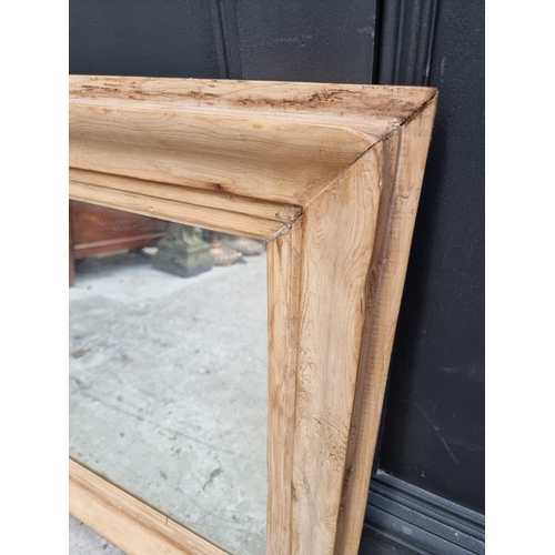 1329 - An old pine framed rectangular wall mirror, 67 x 81cm.