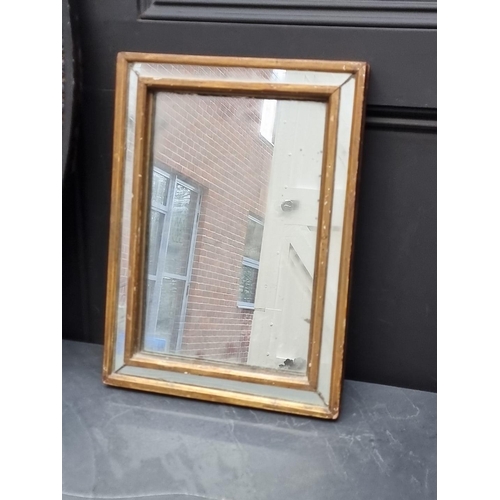 1364 - A small old gilt framed wall mirror, 45.5 x 33.5cm.