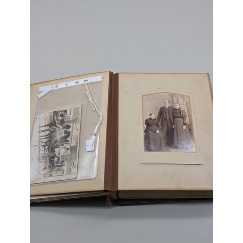 127 - CARTES DES VISITE ALBUM: a Victorian album containing approx 70+ cdv and cabinet cards, padded soft ... 