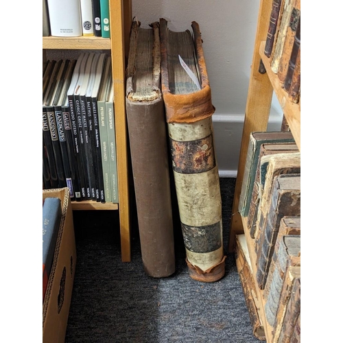 213 - COMPANY LEDGERS: a pair of large folio company ledgers, early 20thc, vellum/calf bindings with some ... 