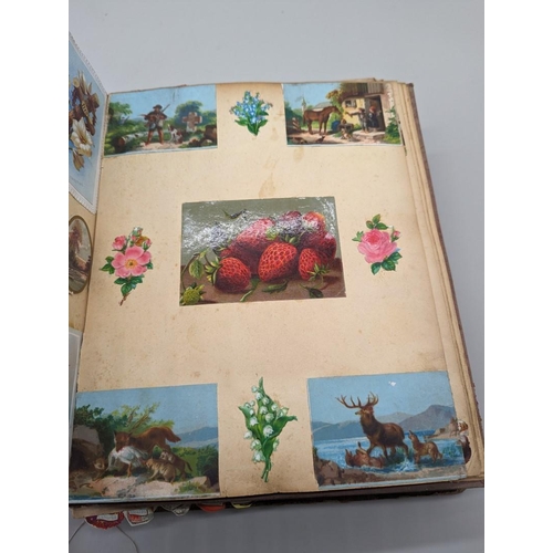 238 - SCRAPBOOKS: a group of 3 19th century scrapbooks, an earlier example containing cut hand coloured en... 