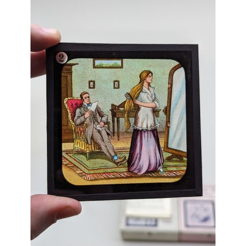 272 - COLOURED LANTERN SLIDES: Uncle Tom's Cabin. Complete, contained in 3 original printed boxes wit... 