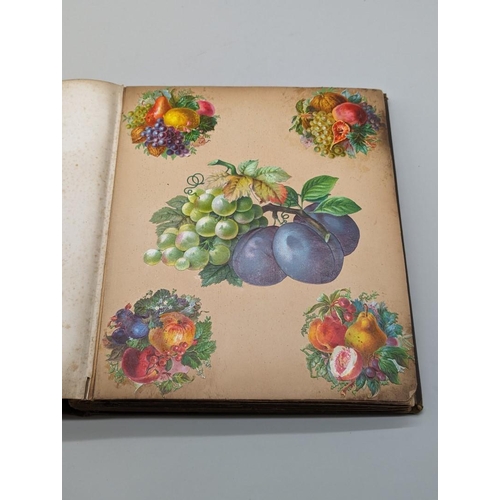 280 - SCRAPBOOK: a Victorian album of chromolithographic scraps and greetings cards, neatly arranged and p... 