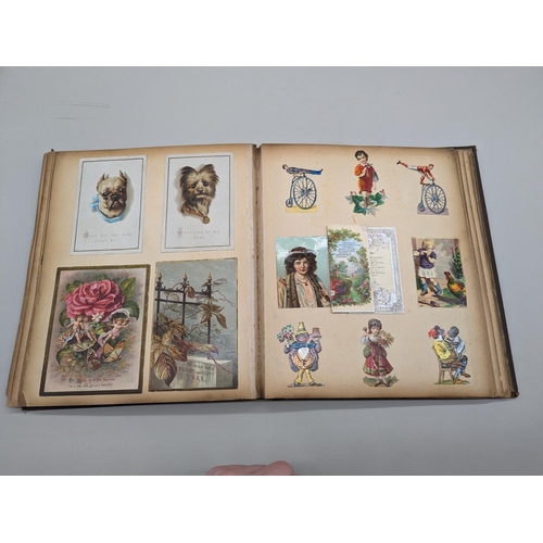 280 - SCRAPBOOK: a Victorian album of chromolithographic scraps and greetings cards, neatly arranged and p... 