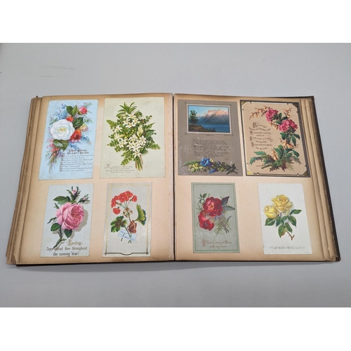 280 - SCRAPBOOK: a Victorian album of chromolithographic scraps and greetings cards, neatly arranged and p... 