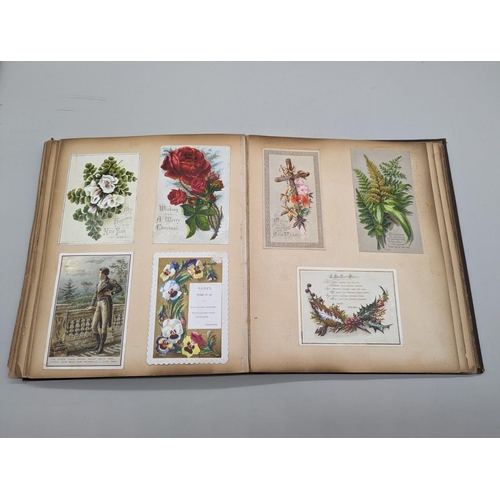 280 - SCRAPBOOK: a Victorian album of chromolithographic scraps and greetings cards, neatly arranged and p... 