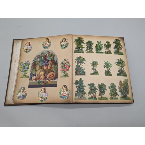 280 - SCRAPBOOK: a Victorian album of chromolithographic scraps and greetings cards, neatly arranged and p... 