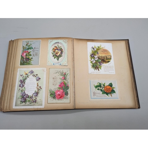 280 - SCRAPBOOK: a Victorian album of chromolithographic scraps and greetings cards, neatly arranged and p... 