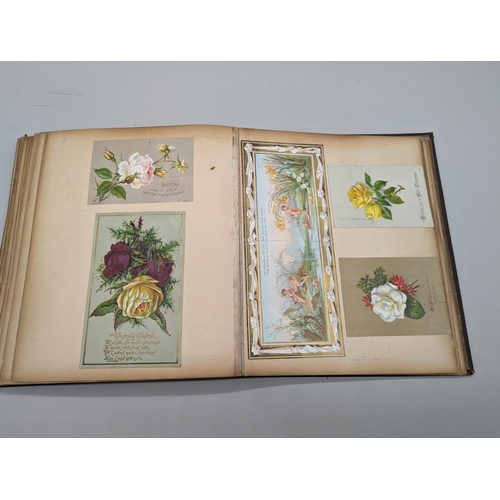 280 - SCRAPBOOK: a Victorian album of chromolithographic scraps and greetings cards, neatly arranged and p... 