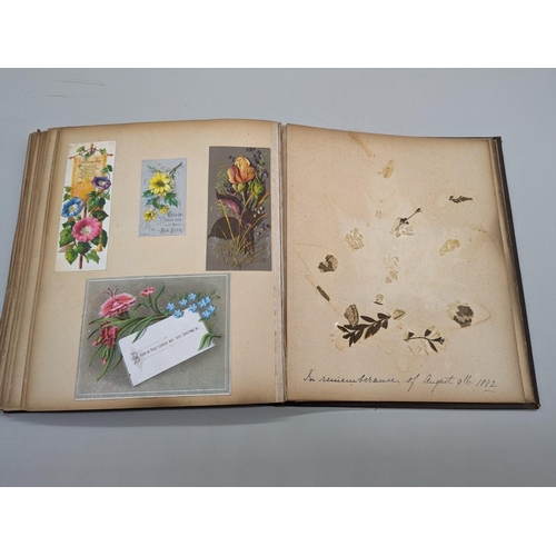 280 - SCRAPBOOK: a Victorian album of chromolithographic scraps and greetings cards, neatly arranged and p... 