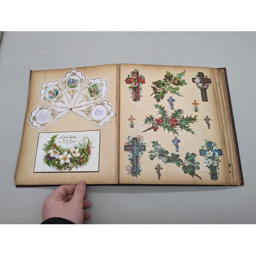 280 - SCRAPBOOK: a Victorian album of chromolithographic scraps and greetings cards, neatly arranged and p... 