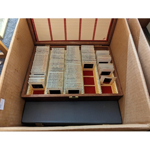 311 - CINE SLIDES: a quantity in 2 boxes; to include F1 photos, mostly 1970s and a RAF golf album.... 