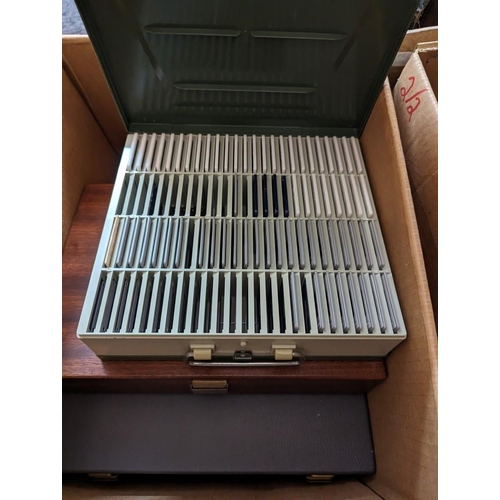 311 - CINE SLIDES: a quantity in 2 boxes; to include F1 photos, mostly 1970s and a RAF golf album.... 