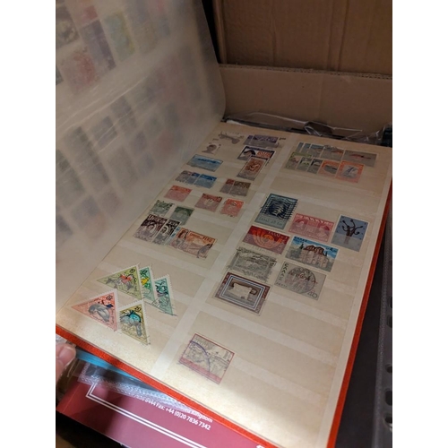 319 - STAMPS/POSTAL HISTORY: a quantity in large box, to include mint stamps packaged. (Box)... 