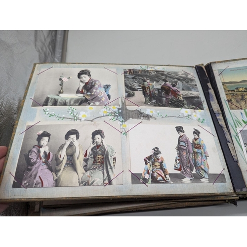 354 - POSTCARDS: oriental black lacquer album of approx 64 postcards, early tinted views predominantl... 