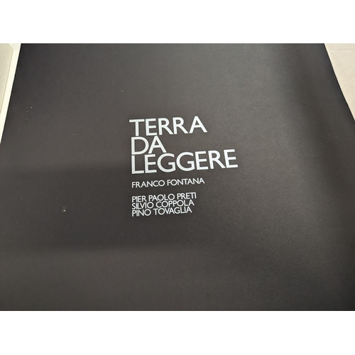 367 - FONTANA (Franco): 'Terra Da Leggere..': colour lithographed plates tipped onto black paper, loosely ... 