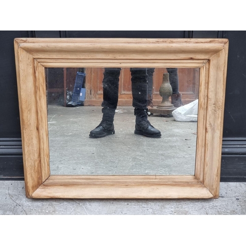 1329 - An old pine framed rectangular wall mirror, 67 x 81cm.