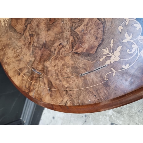 1271 - A Victorian walnut and inlaid oval loo table, 104cm wide.