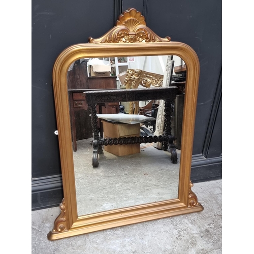 1322 - A reproduction giltwood framed overmantel mirror, 109 x 88cm.