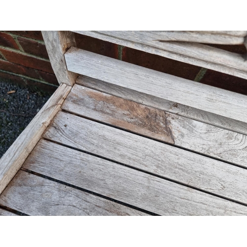 1330 - A teak garden bench, 112cm wide.