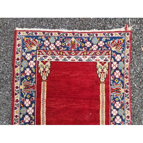 1759 - A Persian prayer rug, having temple design, with floral borders, 140 x 81cm.