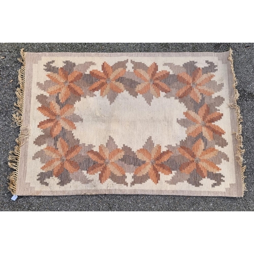 1760 - A Swedish flat weave woollen rug, with floral decoration, 204 x 138cm.