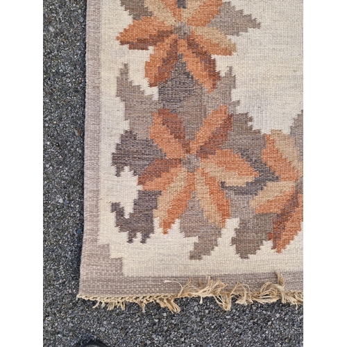 1760 - A Swedish flat weave woollen rug, with floral decoration, 204 x 138cm.