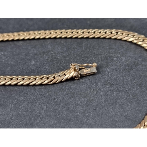 1014 - A 9ct gold chain, 44cm long, 11.2g.