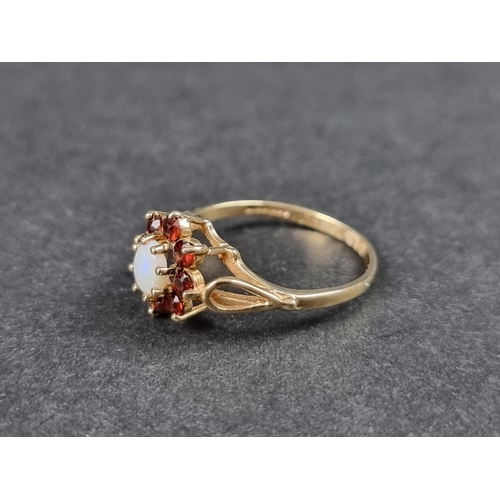 1018 - A 9ct gold opal and garnet cluster ring, size K, Birmingham 1991; together with another 9ct gold rin... 