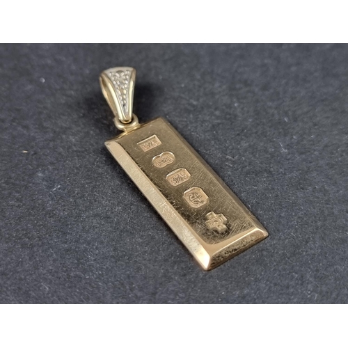 1030 - A 9ct gold ingot pendant, 2000 hallmark, 40mm high including suspension loop, the suspension loop se... 