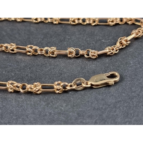 1035 - A yellow metal fancy link necklace, stamped '9k', 51cm long.