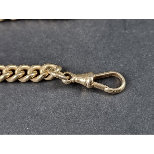 1041 - A yellow metal graduated curb link watch chain, each link stamped 375, 40cm.