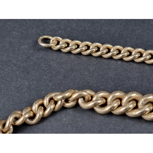 1041 - A yellow metal graduated curb link watch chain, each link stamped 375, 40cm.