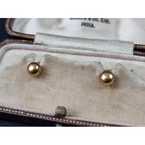 1046 - A pair of yellow metal collar studs, stamped '18ct', cased; together with three other items. (4)... 