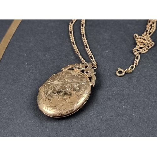 1047 - A 9ct gold locket, 42mm high, on 9ct gold fancy link chain, 47cm long, 10.6g; together with two yell... 