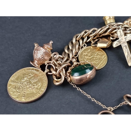 1049 - A charm bracelet, stamped 9c, having padlock clasp, with eleven attached gold and yellow metal charm... 