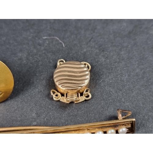 1050 - Two 18ct gold dress studs, 3.6g; together with a 9ct gold saftey pin, 2.2g; a yellow metal tie pin, ... 