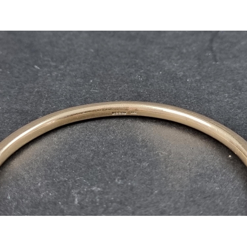 1069 - A 9ct gold bangle, Sheffield 2006, 7.5cm diameter, 44g.