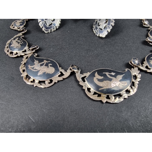 1072 - A Thai niello necklace, stamped '925', approx. 38cm long; together with a similar pair of screw back... 