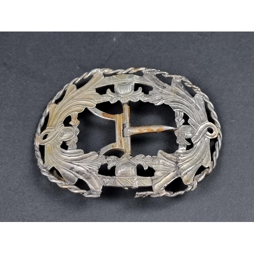 1085 - A large 19th century Dutch white metal belt buckle, .833 standard, 10.5 x 8cm.