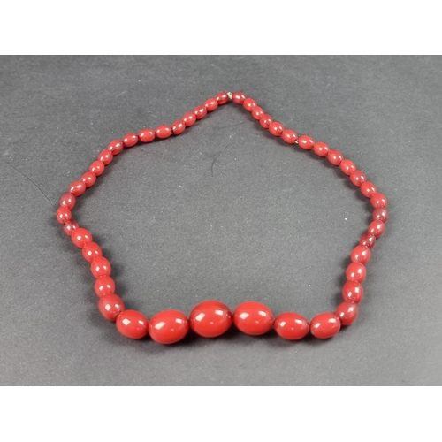 1110 - A Bakelite 'cherry amber' graduated bead necklace, 79cm long, 72g.