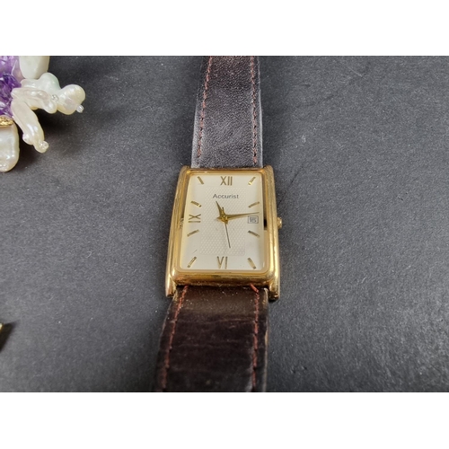 1117 - An Accurist gold plated quartz wristwatch; together with a small quantity of costume jewellery.... 